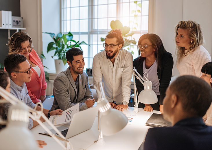 group of marketers around conference table